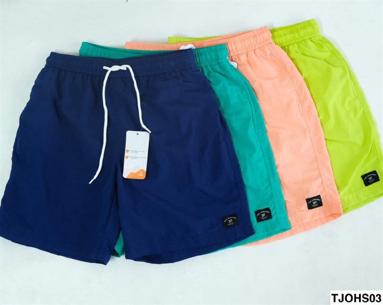 Bốn quần short trải xếp chồng: xanh cobalt, xanh mint, cam đào và xanh lá neon, cạp chun dây rút